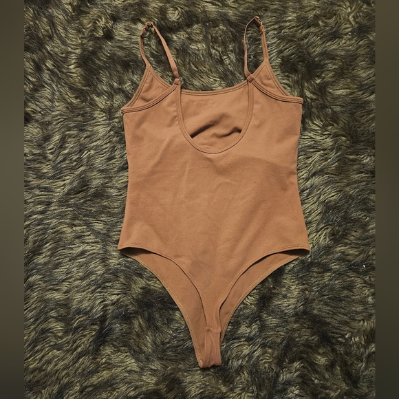 Ptula Bodysuit in rust color - Picture 2 of 3